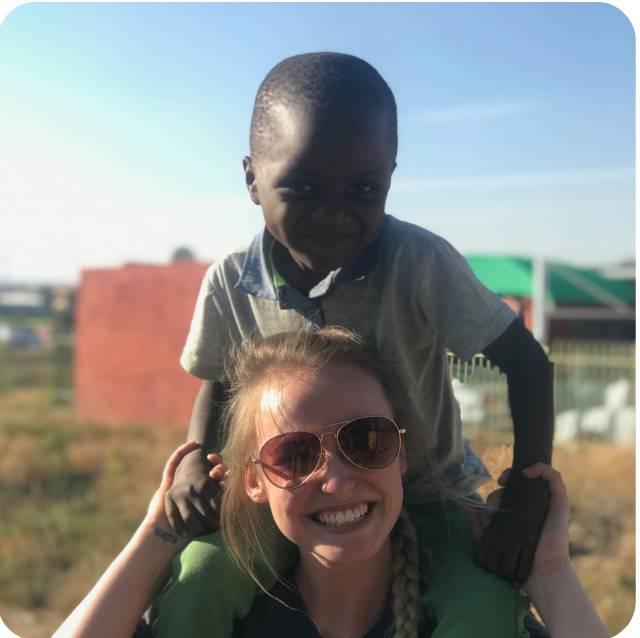 Student with local child during study abroad trip in Namibia